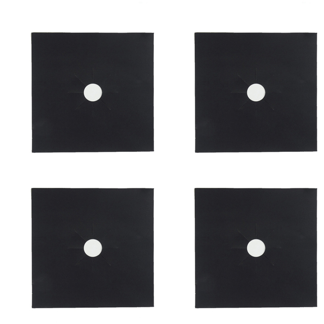 Four black non-stick reusable gas stove burner protector liners